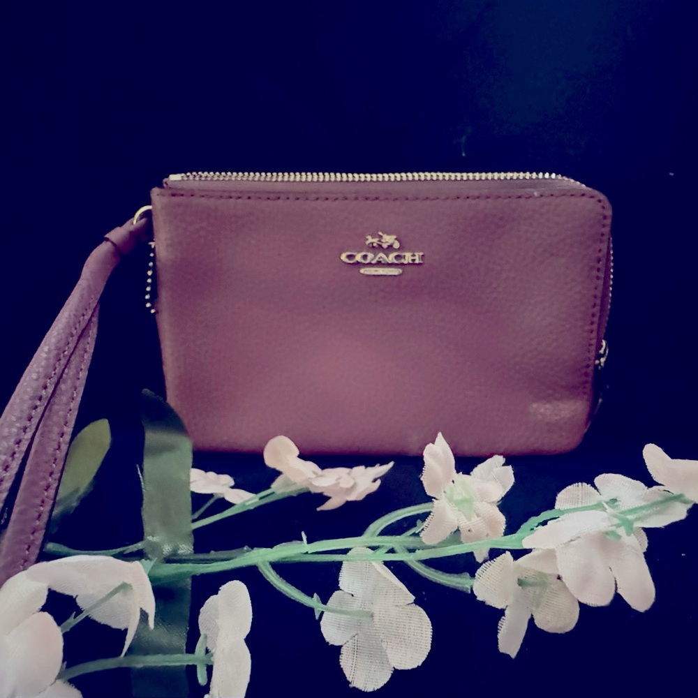 Purple double zipper Coach wristlet. Brand New never used.